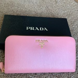 PRADA
Pink Vitello Move Leather Zippy Long Wallet. New with tag